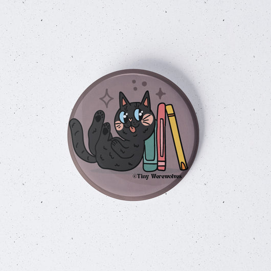 Original artwork by Tiny Werewolves | Black Book Cat 1" Mini Button Pin in | Shop to get your gender neutral Metal Pinback Button