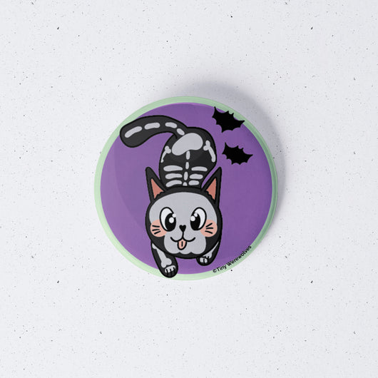 Original artwork by Tiny Werewolves | SkeliCat Spooky 1" Mini Button Pin in | Shop to get your gender neutral Metal Pinback Button
