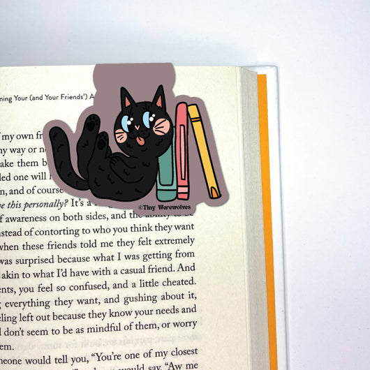 Original artwork by Tiny Werewolves | Black Book Cat Laminated Magnetic Bookmark in | Shop to get your gender neutral Magnetic Bookmark