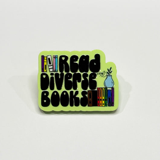 Original artwork by Tiny Werewolves | Read Diverse Books Acrylic Pin in Lime | Shop to get your gender neutral Acrylic Pin