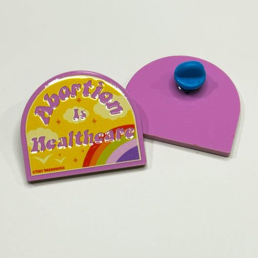 Original artwork by Tiny Werewolves | Abortion is Healthcare Acrylic Pin in | Shop to get your gender neutral Acrylic Pin