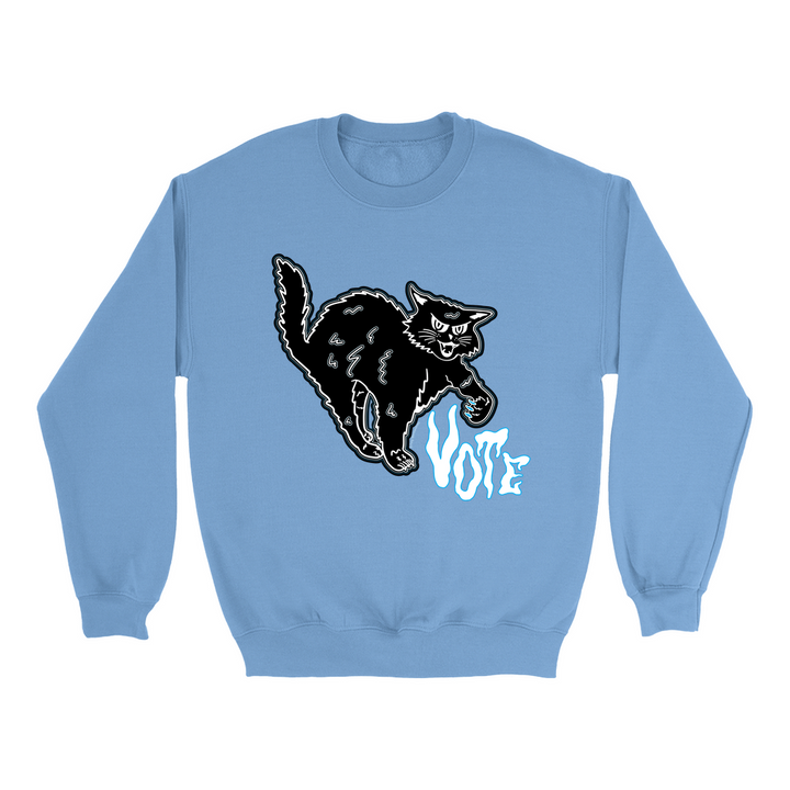 Original artwork by Tiny Werewolves | Retro Spooky Cat Vote Crew Sweatshirt in Carolina Blue | Shop to get your gender neutral Crew