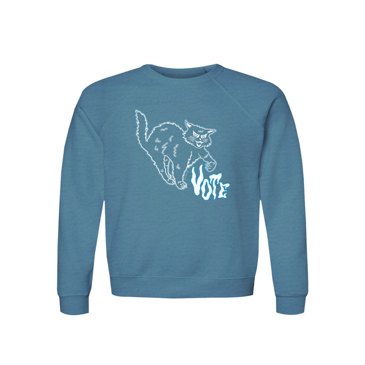 Original artwork by Tiny Werewolves | Retro Spooky Cat Vote Raglan Crew Sweatshirt in Heather Deep Teal | Shop to get your gender neutral Crew