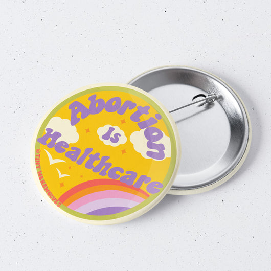 Original artwork by Tiny Werewolves | Abortion Is Healthcare 1" Mini Button Pin in | Shop to get your gender neutral Metal Pinback Button