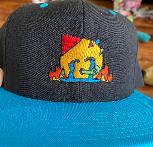 Original artwork by Tiny Werewolves | Chaotic Party Emoji Embroidered Snapback in | Shop to get your gender neutral Snapback