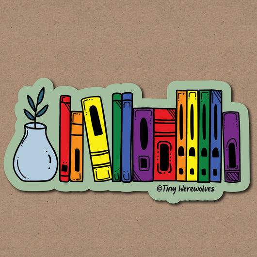 Original artwork by Tiny Werewolves | Rainbow Bookshelf Pride Sticker in 5" Sticker | Shop to get your gender neutral Sticker