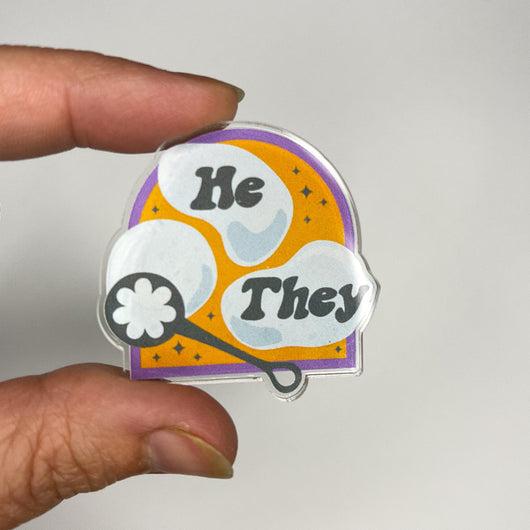 Original artwork by Tiny Werewolves | He / They Pronouns Bubble Acrylic Pin in | Shop to get your gender neutral Acrylic Pin