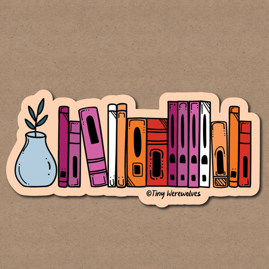 Original artwork by Tiny Werewolves | Lesbian Bookshelf Pride Sticker in 5" Sticker | Shop to get your gender neutral Sticker